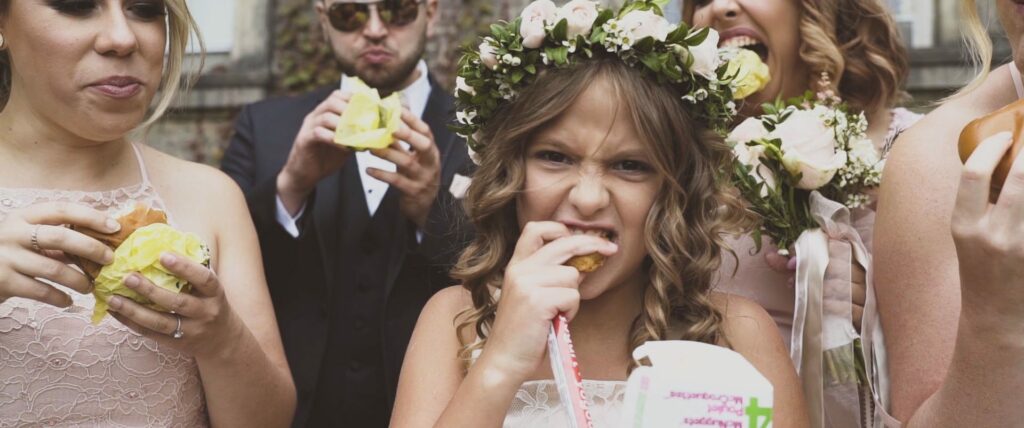 flower girl wedding eating McDonalds burger